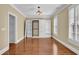 Bedroom featuring hardwood floors, a murphy bed, crown molding, and neutral walls at 775 Mountain View Nw Ter, Marietta, GA 30064