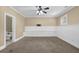 Spacious bedroom features carpeting, wainscoting, and en suite bathroom at 775 Mountain View Nw Ter, Marietta, GA 30064
