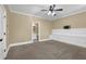 Bedroom featuring carpeting, wainscoting, and en suite bathroom at 775 Mountain View Nw Ter, Marietta, GA 30064