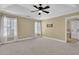 Bright bedroom with large windows and neutral carpet at 775 Mountain View Nw Ter, Marietta, GA 30064