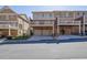 Multi-level townhomes with backyard decks, garages, and manicured lawns at 775 Mountain View Nw Ter, Marietta, GA 30064