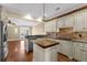 Kitchen featuring island, granite countertops, stainless steel appliances, and breakfast bar at 775 Mountain View Nw Ter, Marietta, GA 30064