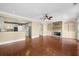 Hardwood floors accent open floor plan, connecting living room, fireplace, and kitchen at 775 Mountain View Nw Ter, Marietta, GA 30064