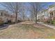 Beautiful street view with manicured lawns lined with upscale townhomes at 775 Mountain View Nw Ter, Marietta, GA 30064