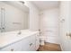 Bathroom with a tub-shower, toilet, and vanity at 2225 Saint Thomas Way, Suwanee, GA 30024
