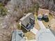 Aerial view of house surrounded by trees and greenery at 4046 Arnolds Mill Opas, Douglasville, GA 30135