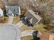 Aerial view of a home nestled in a cul-de-sac with mature trees at 4046 Arnolds Mill Opas, Douglasville, GA 30135
