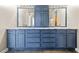 Bathroom vanity with double sinks, a marble countertop, cabinets and large mirrors at 4046 Arnolds Mill Opas, Douglasville, GA 30135