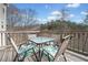 Outdoor deck area with seating for four, perfect for entertaining at 4046 Arnolds Mill Opas, Douglasville, GA 30135