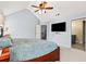 Spacious bedroom with a vaulted ceiling, ceiling fan, television, and ensuite bathroom at 4046 Arnolds Mill Opas, Douglasville, GA 30135