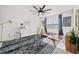 Charming ' bedroom with playful decor, a ceiling fan, and natural light at 828 Royal Red Ct, Mcdonough, GA 30253