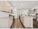 Modern kitchen with stainless appliances, granite counters, and ample cabinet space at 828 Royal Red Ct, Mcdonough, GA 30253