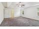 Bright bedroom with carpet, a ceiling fan and two windows at 903 Hollytree Pl, Acworth, GA 30102