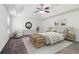 Staged bedroom with chair, dresser, lamps and decorated queen sized bed at 903 Hollytree Pl, Acworth, GA 30102