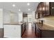 Kitchen island has stainless steel dishwasher, sink and granite countertops at 903 Hollytree Pl, Acworth, GA 30102