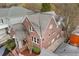 Aerial view of a well-maintained brick house with mature trees and a neat roof at 1181 Lanier Ne Blvd, Atlanta, GA 30306