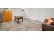 Basement featuring a foosball table, wooden storage cabinet and comfortable couch for entertainment and relaxation at 1181 Lanier Ne Blvd, Atlanta, GA 30306