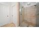 Walk-in shower featuring glass enclosure and elegant tile work offers a luxurious showering experience at 1181 Lanier Ne Blvd, Atlanta, GA 30306