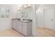Bathroom with double vanity, granite countertops, and well-lit mirror provides ample space for grooming at 1181 Lanier Ne Blvd, Atlanta, GA 30306