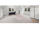 Spacious bedroom featuring neutral paint, plush carpeting, two windows and space for a home office setup at 1181 Lanier Ne Blvd, Atlanta, GA 30306
