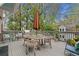 Spacious deck with outdoor seating and grill for dining with a shaded patio umbrella for entertaining al fresco at 1181 Lanier Ne Blvd, Atlanta, GA 30306