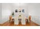 Formal dining room with hardwood floors, wainscotting, and natural light at 1181 Lanier Ne Blvd, Atlanta, GA 30306