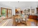 Spacious kitchen with granite countertops, stainless steel appliances, and a dining area with backyard access at 1181 Lanier Ne Blvd, Atlanta, GA 30306