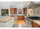 Gourmet kitchen with stainless steel appliances, granite countertops, and custom cabinetry at 1181 Lanier Ne Blvd, Atlanta, GA 30306
