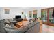 Spacious living room with comfortable seating and access to an outdoor deck at 1181 Lanier Ne Blvd, Atlanta, GA 30306