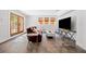 Sunlit living room features a flatscreen TV, cozy seating, and outdoor access for relaxation and entertainment at 1181 Lanier Ne Blvd, Atlanta, GA 30306