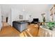 Bright living room with hardwood floors, comfortable seating and natural light at 1181 Lanier Ne Blvd, Atlanta, GA 30306