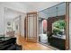 View from interior doors onto outdoor patio area with brick and comfortable seating at 1181 Lanier Ne Blvd, Atlanta, GA 30306
