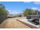 Backyard with hot tub featuring a comfortable lounge chair and patio area at 1695 Stone Meadow Rd, Lithonia, GA 30058