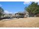 Backyard featuring a pergola with outdoor seating, perfect for relaxation and entertaining at 1695 Stone Meadow Rd, Lithonia, GA 30058