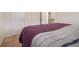 This bedroom has a neutral color palette with a comfortable plush bed at 1695 Stone Meadow Rd, Lithonia, GA 30058