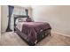 Carpeted bedroom with modern decor and a large window for natural light at 1695 Stone Meadow Rd, Lithonia, GA 30058
