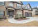 Lovely home with two-car garage, beautiful landscaping, and traditional design at 1695 Stone Meadow Rd, Lithonia, GA 30058