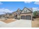 Beautiful home with two car garage and lovely landscaping at 1695 Stone Meadow Rd, Lithonia, GA 30058