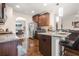 Modern kitchen features stainless steel appliances and granite countertops at 1695 Stone Meadow Rd, Lithonia, GA 30058