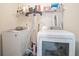 The laundry room has a modern washer and dryer for your convenience at 1695 Stone Meadow Rd, Lithonia, GA 30058