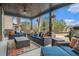 Spacious covered patio with comfortable seating perfect for outdoor relaxation and entertainment at 1695 Stone Meadow Rd, Lithonia, GA 30058