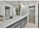Modern bathroom features double vanity with sleek gray cabinets and stylish mirror at 430 Parkbrook Way, Canton, GA 30114