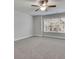 This cozy bedroom is bright with natural light and features a ceiling fan at 430 Parkbrook Way, Canton, GA 30114