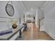 Bright and spacious foyer with hardwood floors and decoratively appointed console tables at 430 Parkbrook Way, Canton, GA 30114