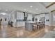 Spacious kitchen featuring a large island, stainless steel appliances, and hardwood floors at 430 Parkbrook Way, Canton, GA 30114