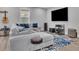 Cozy living room featuring comfortable seating, entertainment setup, and stylish decor at 430 Parkbrook Way, Canton, GA 30114
