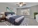 Inviting main bedroom features a plush bed, soft rug, and bright window views at 430 Parkbrook Way, Canton, GA 30114