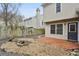 Relaxing backyard with a gravel sitting area and a brick patio at 1002 Defoors Nw Lndg, Atlanta, GA 30318