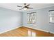Bedroom featuring hardwood floors and two windows for plenty of natural light at 1002 Defoors Nw Lndg, Atlanta, GA 30318