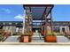 Striking entrance to The Works, featuring modern architecture and inviting landscaping at 1002 Defoors Nw Lndg, Atlanta, GA 30318